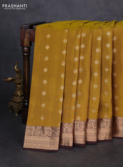 Kanchipuram silk saree dark mustard and coffee brown with allover zari woven buttas and rich zari woven border