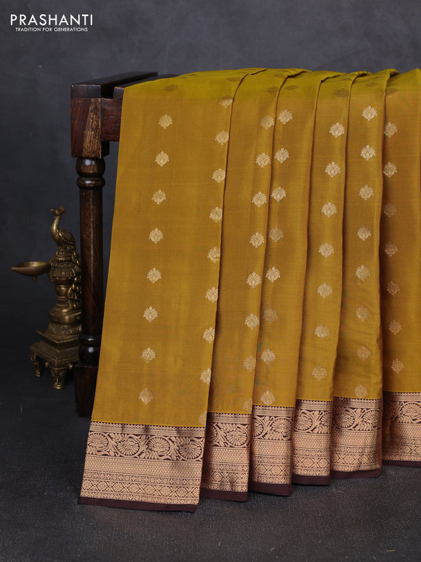 Kanchipuram silk saree dark mustard and coffee brown with allover zari woven buttas and rich zari woven border