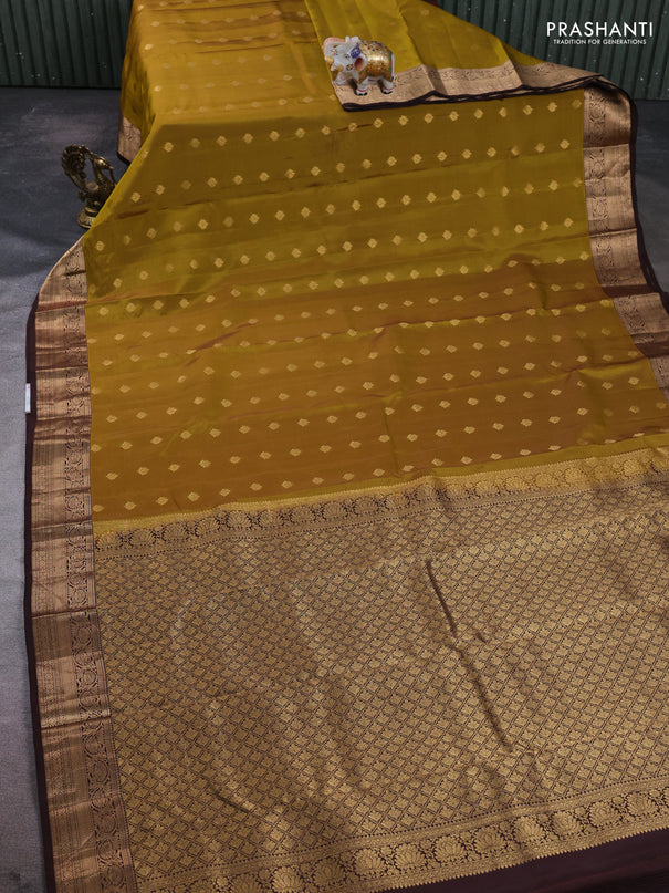 Kanchipuram silk saree dark mustard and coffee brown with allover zari woven buttas and rich zari woven border