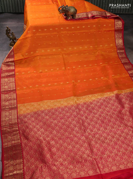 Kanchipuram silk saree orange and reddish pink with allover zari woven buttas and rich zari woven border