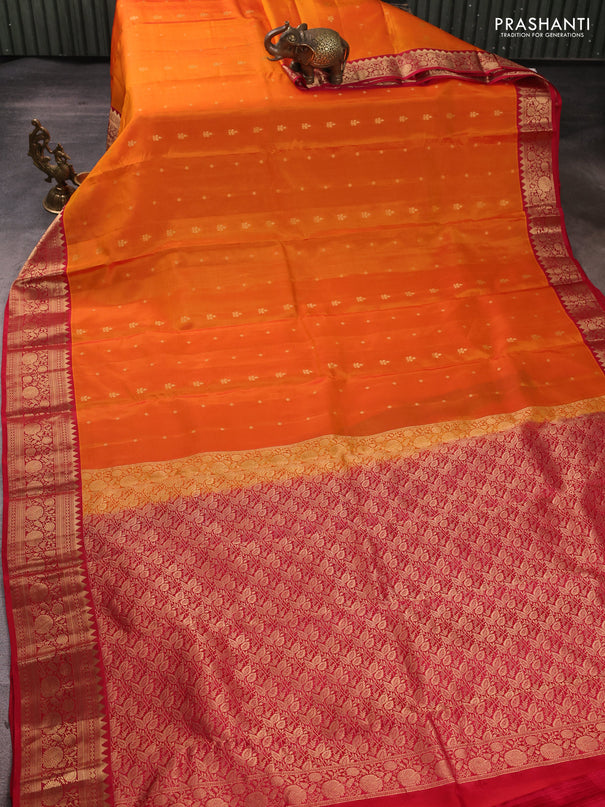 Kanchipuram silk saree orange and reddish pink with allover zari woven buttas and rich zari woven border
