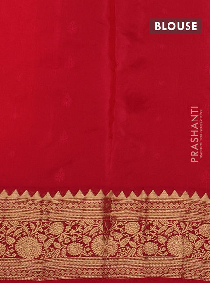 Kanchipuram silk saree orange and reddish pink with allover zari woven buttas and rich zari woven border