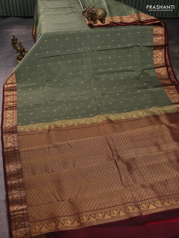 Kanchipuram silk saree pastel green shade and deep maroon with allover zari woven 1000 buttas and annam & temple zari woven border