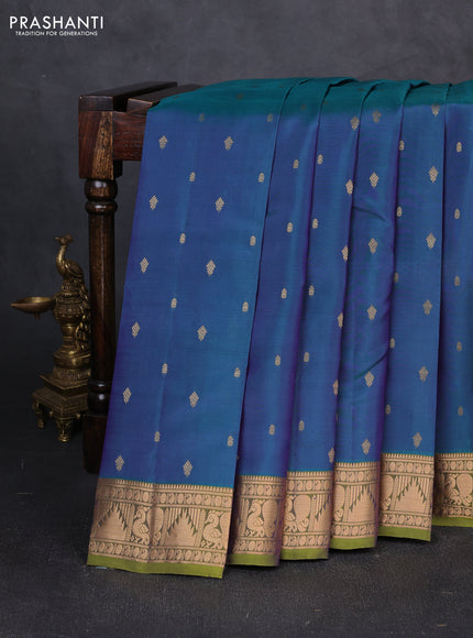 Kanchipuram silk saree dual shade of peacock green and mehendi green with allover zari woven 1000 buttas and annam & temple zari woven border