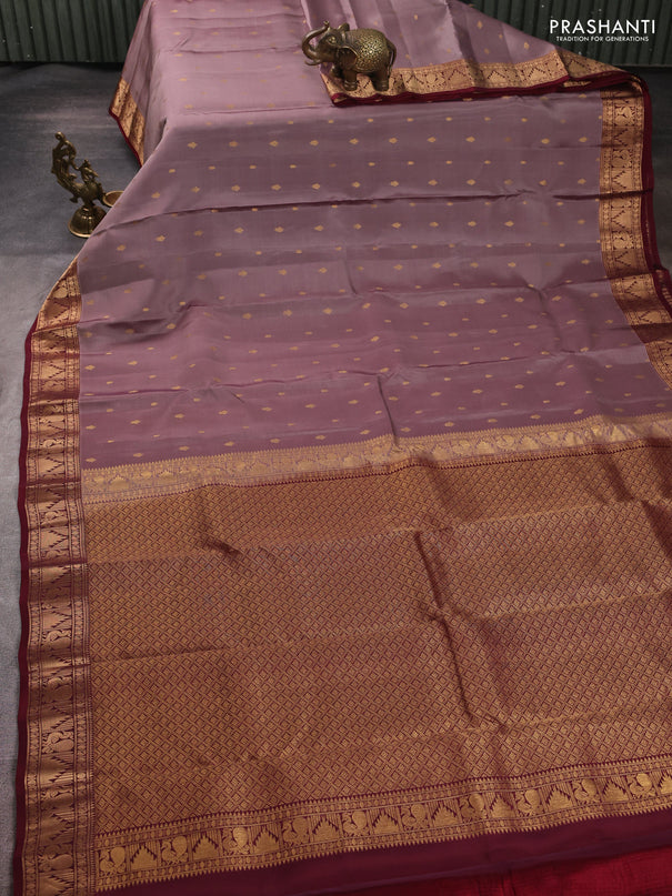 Kanchipuram silk saree pastel pink hade and maroon with allover zari woven 1000 buttas and annam & temple zari woven border