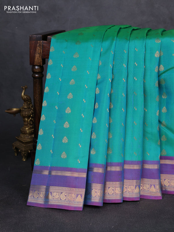 Kanchipuram silk saree dual shade of teal green and purple with allover zari woven 1000 buttas and rettapet zari woven border