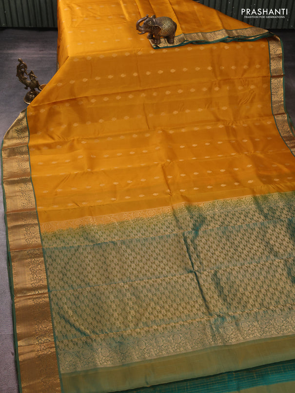 Kanchipuram silk saree mustard yellow and dual shade of teal green with allover zari woven buttas and rich zari woven border