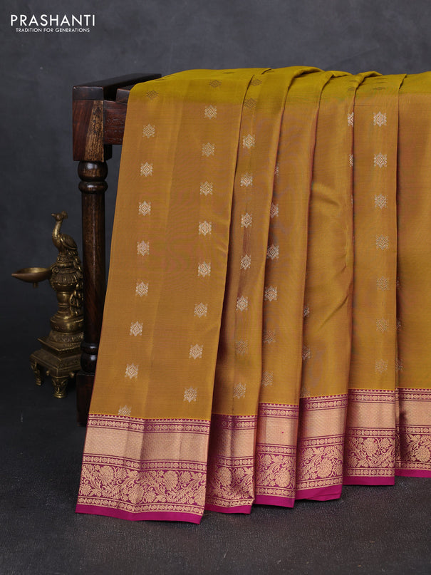 Kanchipuram silk saree dark mustard and dark magenta pink with allover zari woven buttas and rich zari woven border