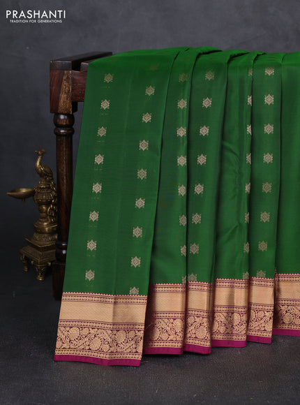 Kanchipuram silk saree green and dark magenta pink with allover zari woven buttas and rich zari woven border