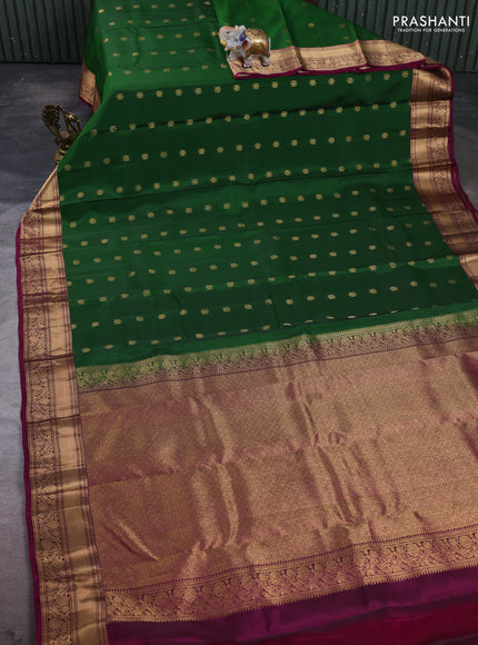 Kanchipuram silk saree green and dark magenta pink with allover zari woven buttas and rich zari woven border