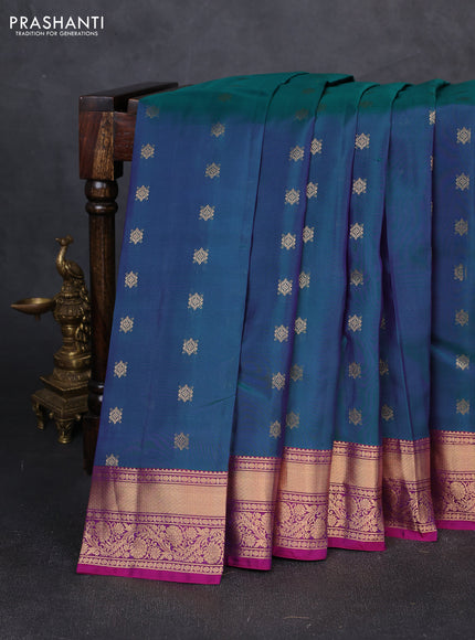 Kanchipuram silk saree dual shade of peacock green and purple with allover zari woven buttas and rich zari woven border