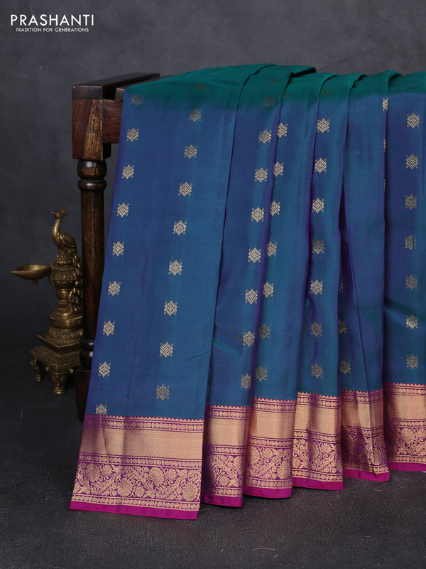 Kanchipuram silk saree dual shade of peacock green and purple with allover zari woven buttas and rich zari woven border