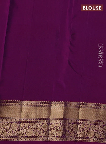 Kanchipuram silk saree dual shade of peacock green and purple with allover zari woven buttas and rich zari woven border