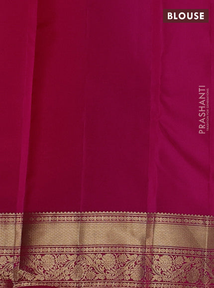 Kanchipuram silk saree dual shade of pinkish orange and pink with allover zari woven buttas and rich zari woven border