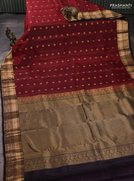 Kanchipuram silk saree maroon and deep jamun shade with allover zari woven buttas and rich zari woven border