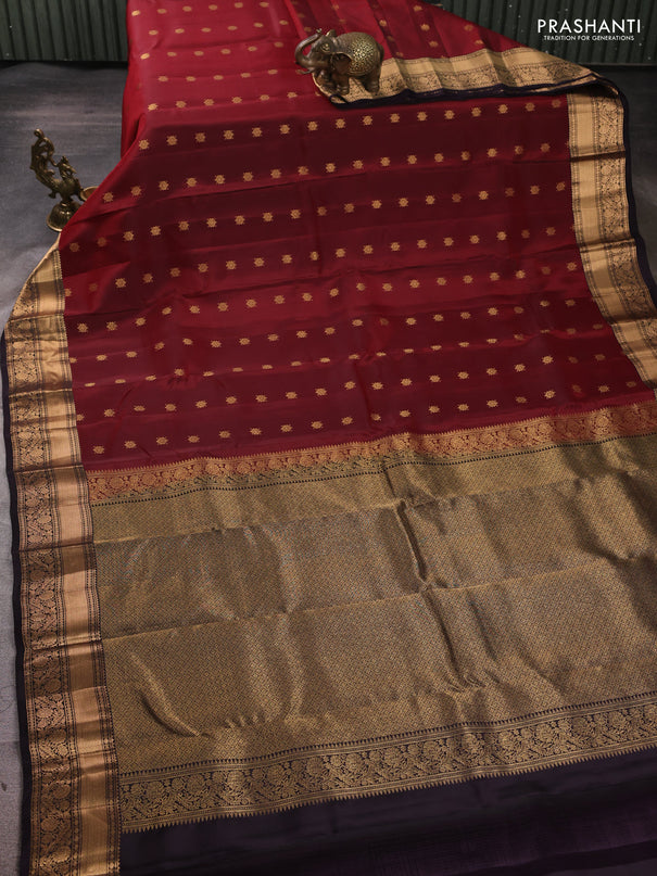 Kanchipuram silk saree maroon and deep jamun shade with allover zari woven buttas and rich zari woven border