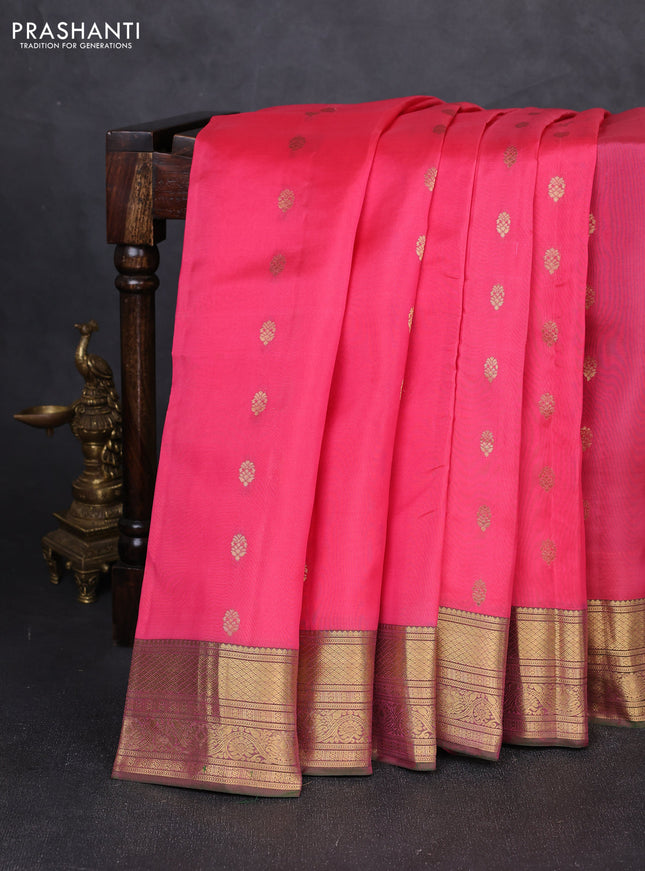 Kanchipuram silk saree candy pink and dual shade of greenish pink with allover zari woven buttas and rich zari woven border