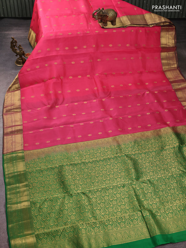 Kanchipuram silk saree candy pink and dual shade of greenish pink with allover zari woven buttas and rich zari woven border