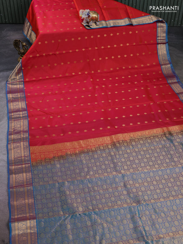 Kanchipuram silk saree dual shade of pinkish orange and dual shade of blue with allover zari woven 1000 buttas and rich zari woven border