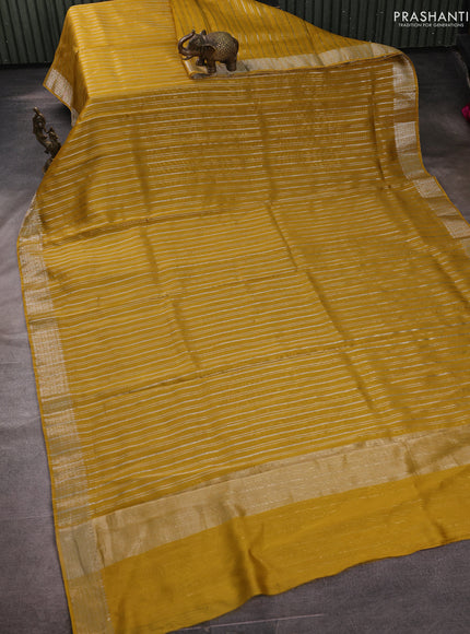 Banarasi silk cotton saree mustard yellow with allover zari stripe pattern and zari woven border