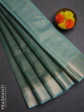 Banarasi silk cotton saree green and pastel blue with allover small zari checked pattern and zari woven border