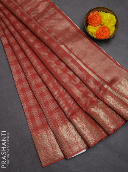 Banarasi silk cotton saree rust shade with allover small zari checked pattern and zari woven border