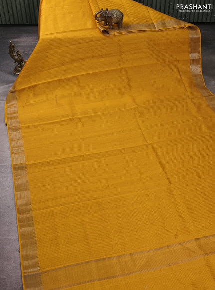 Banarasi silk cotton saree mustard yellow with allover small zari checked pattern and zari woven border
