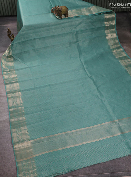 Banarasi silk cotton saree pastel green with allover small zari checked pattern and zari woven border