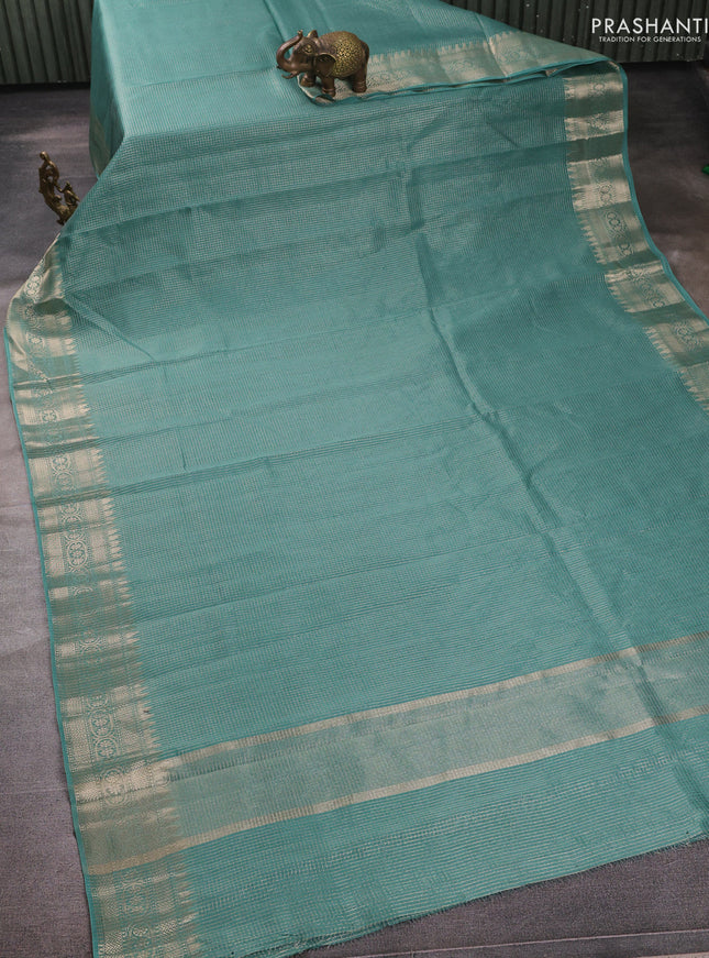 Banarasi silk cotton saree pastel green with allover small zari checked pattern and zari woven border