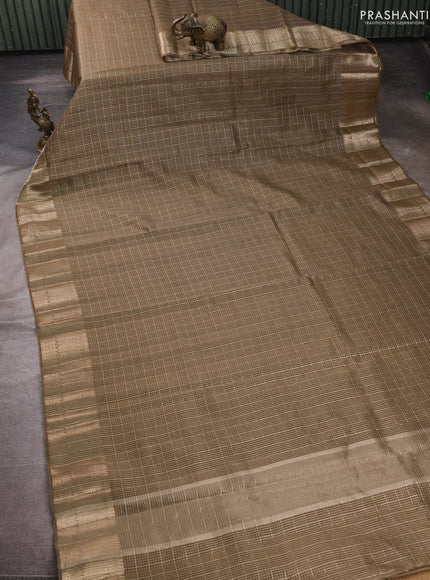 Banarasi silk cotton saree mehendi green with allover small zari checked pattern and zari woven border
