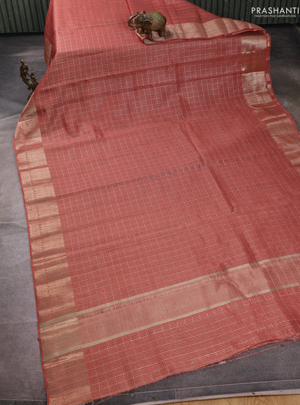 Banarasi silk cotton saree rust shade with allover small zari checked pattern and zari woven border