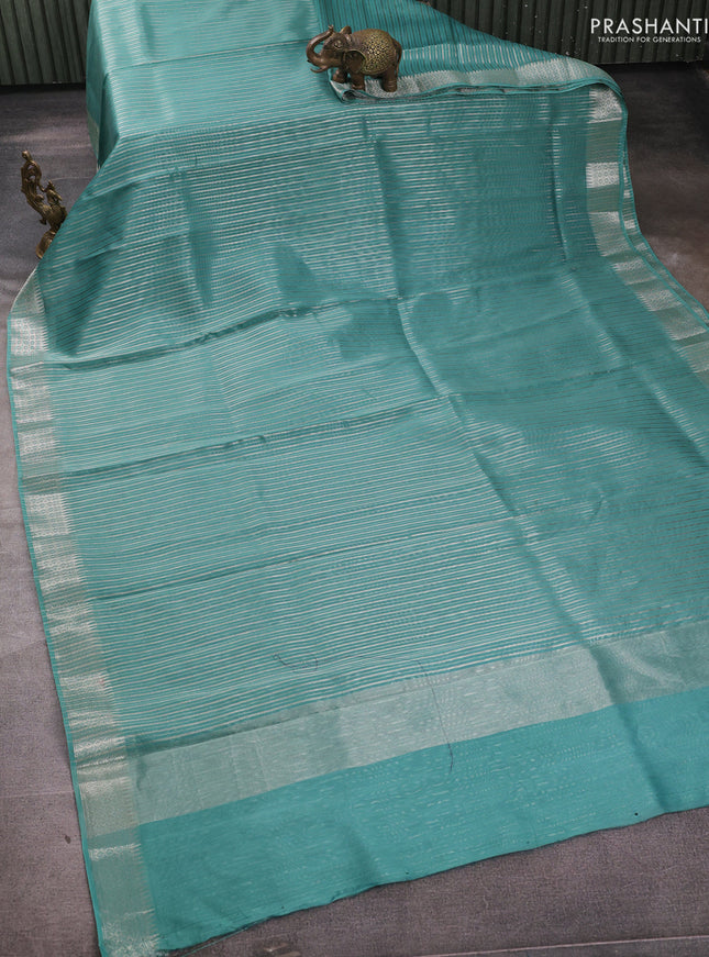 Banarasi silk cotton saree teal green with allover zari stripe pattern and zari wovenn border