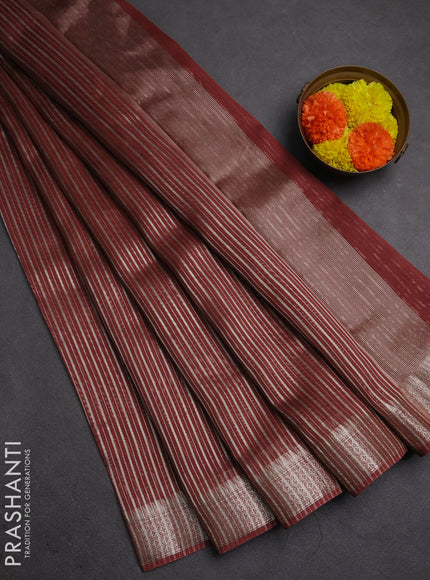Banarasi silk cotton saree rust shade with allover zari stripe pattern and zari wovenn border