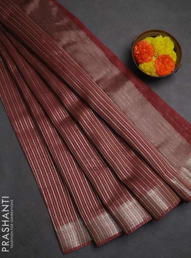 Banarasi silk cotton saree rust shade with allover zari stripe pattern and zari wovenn border