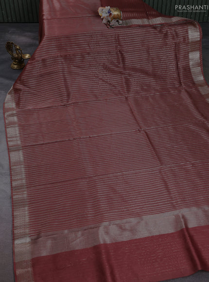 Banarasi silk cotton saree rust shade with allover zari stripe pattern and zari wovenn border