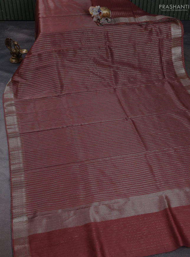 Banarasi silk cotton saree rust shade with allover zari stripe pattern and zari wovenn border