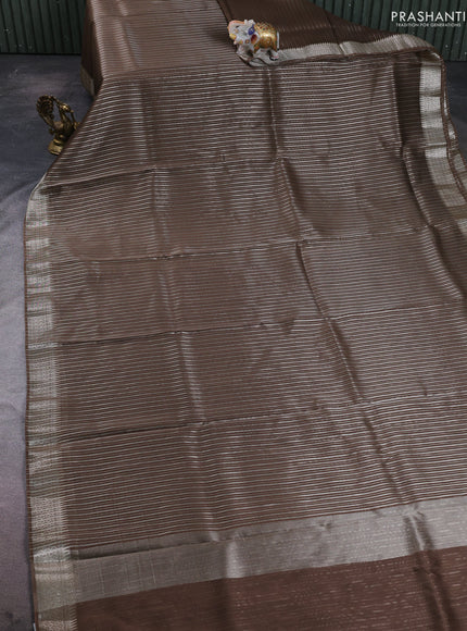 Banarasi silk cotton saree olive green with allover zari stripe pattern and zari wovenn border