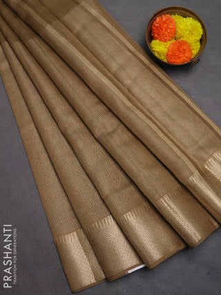 Banarasi silk cotton saree mehendi green with half & half style and zari woven border