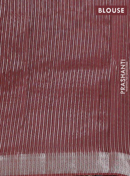 Banarasi silk cotton saree rust shade with allover zari stripe pattern and zari woven border