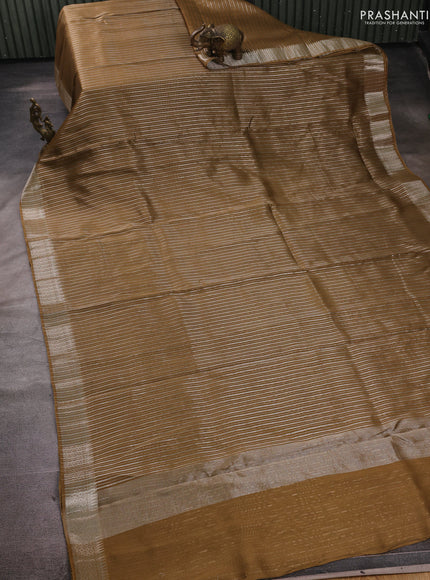 Banarasi silk cotton saree mehendi green with allover zari stripe pattern and zari woven border
