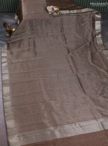 Banarasi silk cotton saree olive green with allover zari stripe pattern and zari woven border