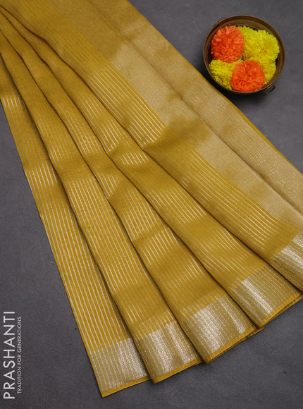 Banarasi silk cotton saree mustard yellow with allover zari stripe pattern and zari woven border
