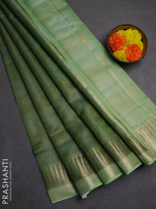 Banarasi silk cotton saree light green and pista green with allover zari stripe pattern and zari woven border