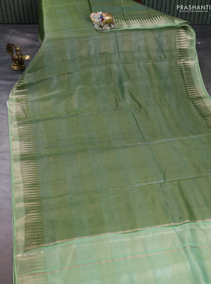 Banarasi silk cotton saree light green and pista green with allover zari stripe pattern and zari woven border