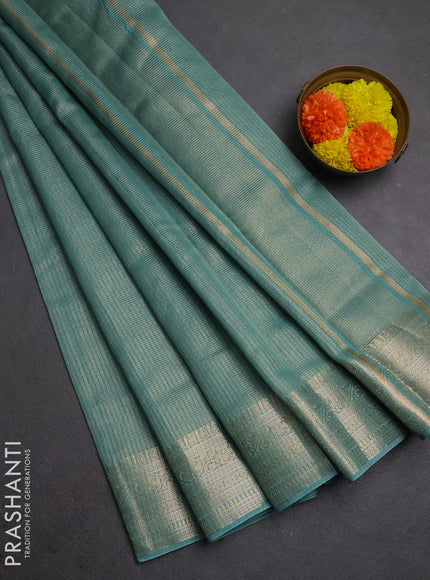 Banarasi silk cotton saree teal green shade with allover small zari woven border and zari woven border