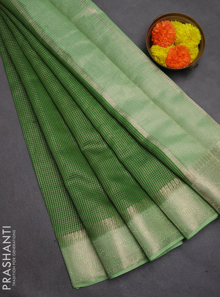 Banarasi silk cotton saree light green and pista green with allover small zari checked pattern and zari woven border