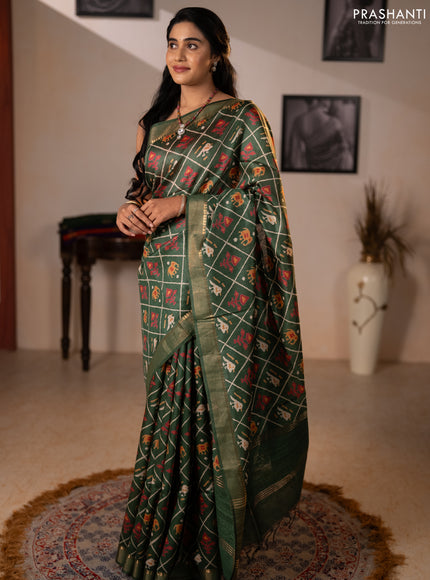 Munga tussar silk saree green with allover patola prints and zari woven border
