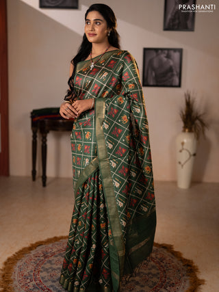 Munga tussar silk saree green with allover patola prints and zari woven border