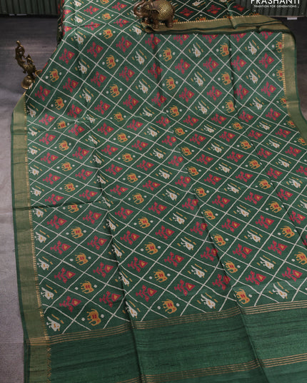 Munga tussar silk saree green with allover patola prints and zari woven border