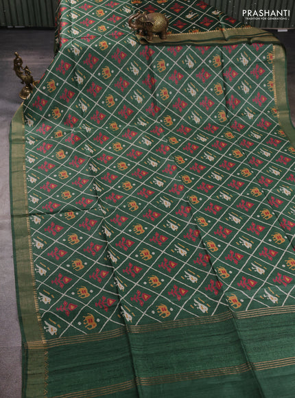 Munga tussar silk saree green with allover patola prints and zari woven border